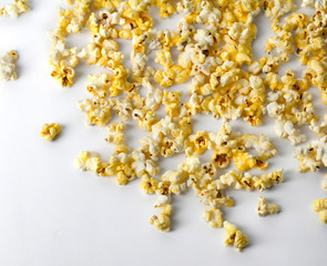 Popcorn at white background. Flat lay, top view