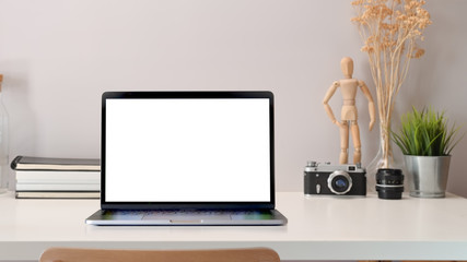 Minimalist workspace desk and laptop