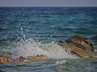 Waves crashing against the rock
