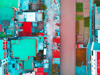 Aerial view of buildings with colorful roofs