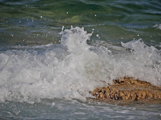 Waves crashing against the rock