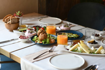 Turkish breakfast with various plates on a table