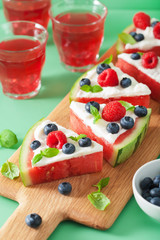 watermelon pizza slices with yogurt and berries, summer dessert