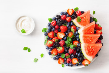 Obraz na płótnie Canvas fruit and berry platter over white. blueberry, strawberry, raspberry, blackberry, watermelon