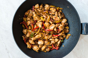 Manchurian Chicken with Soy Sauce, Julienne  Vegetables in Iron Wok Pan / Asian Style Cooking