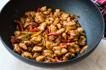 Manchurian Chicken with Soy Sauce, Julienne  Vegetables in Iron Wok Pan / Asian Style Cooking