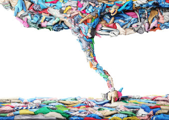 Clothes in the form of a tornado on a white background. Clothing concept.