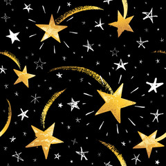 Seamless pattern with white and gold hand drawn vector falling stars in doodle style isolated on black background. 