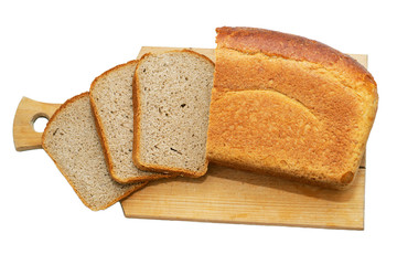 Loaf of bread with several slices on a wooden board isolated on white background