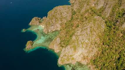 blue lagoons and cliffs of tropical mountain island. aerial view seascape, tropical landscape. Palawan, Philippines, Coron. travel concept