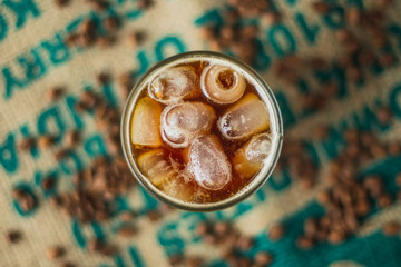 Close up black orange coffee, cold coffee cocktail recipe idea. Selective focus