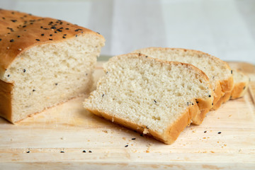 Homemade white bread with sesame. Selective focus, close-up.