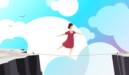 Woman walking over gap on a tightrope
