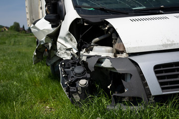 Wreck of vehicle after car crash and accident. Frontal part with of automible is damaged and needed...