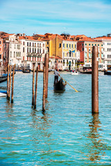 Fototapeta na wymiar magical landscape with gondola on the Grand Canal in Venice, Italy. popular tourist attraction. Wonderful exciting places. (vacation, rest - concept)