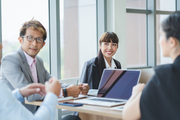 Group of asian business listening to colleague meeting team at office.Business Team Meeting Presentation,Conference Planning Business Concept