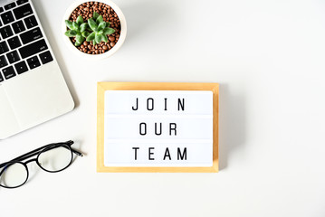 join our team text on lightbox composition on white table background,Business Concept