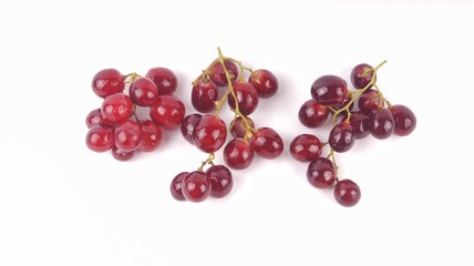 Red grapes isolated on white background