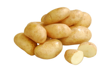 A lot of raw potatoes on a white isolated background
