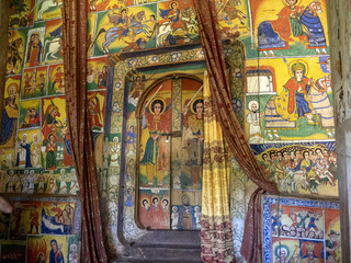 Religious frescoes on the walls of Debere Tsehay tekele on Lake Tana in Ethiopia