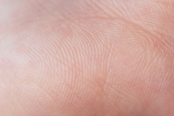 Human skin texture of hand palm, close up background with selective focus