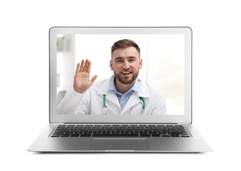 Using laptop for video chat with doctor on white background. Online consultation