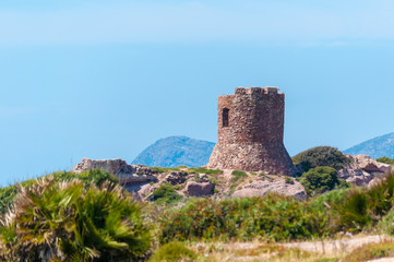 Fototapeta na wymiar Ancient tower on the coast