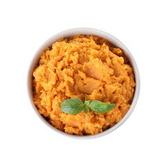 Bowl with mashed sweet potatoes on white background, top view