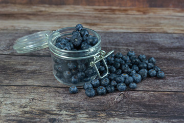 Blueberries in fresh organic yogurt in glass