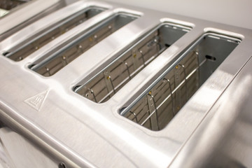 Obraz premium A closeup shot of a toaster's bread slots