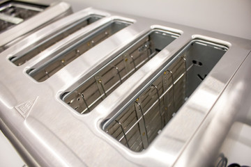 Obraz premium A closeup shot of a toaster's bread slots