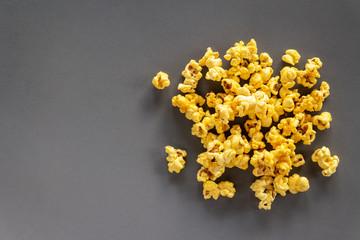 Popcorn on grey background with copy space
