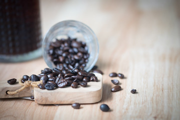 Fototapeta na wymiar Pile of medium or dark roasted coffee beans