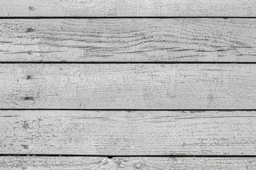 Old wooden planks texture background. Grey wooden fence from boards vintage background. Wood texture