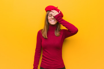 Young french artist woman forgetful, realize something