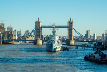 Obraz premium London the river Thames showing city skyline and featuring HMS Belfast and Tower Bridge