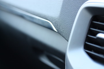 Macro of vehicle dashboard with air vent