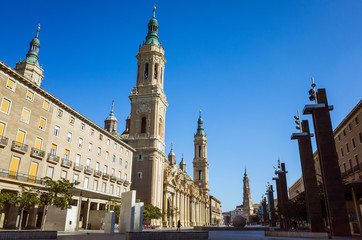 Fototapeta na wymiar Zaragoza, Aragon, Spain 2019 : Baroque facade of the Basilica of Our Lady of the Pillar at Plaza del Pilar square. It is reputed to be the first church dedicated to Mary in history. 