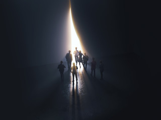 Fototapeta premium group of people at the door leading to the light