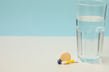 Stethoscope, prescription and medication on doctors table