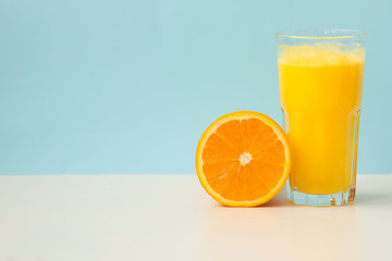 Effervescent vitamin C tablet bubbles in glass of water