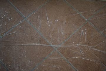 Floor covered with transparent plastic