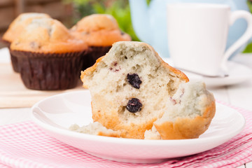 Blueberry muffins with afternoon tea in the garden