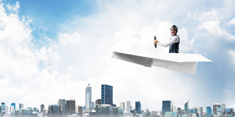 Fototapeta na wymiar Business motivation concept with pilot airplane