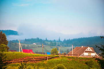 landscape with houses and blue sky