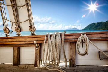 Slim young woman in summer dress on ship and free space for your decoration. 