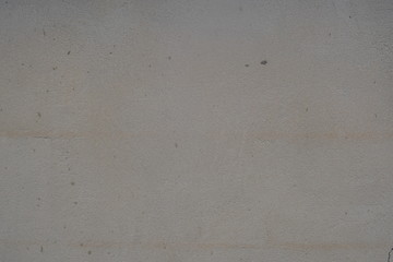 Detail of an old wall with light plaster of lime mortar
