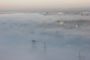 Fototapeta na wymiar Morning fog over the city