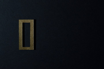gold number zero on dark background