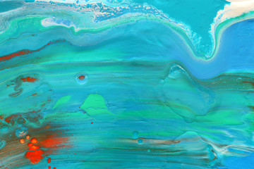 photography of abstract marbleized effect background. Blue, mint and white creative colors. Beautiful paint with the addition of gold